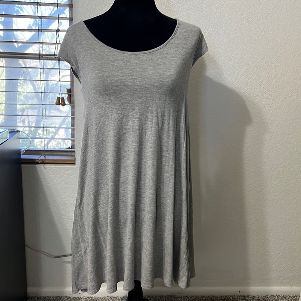 Solid tee dress with crisscross detail in the back